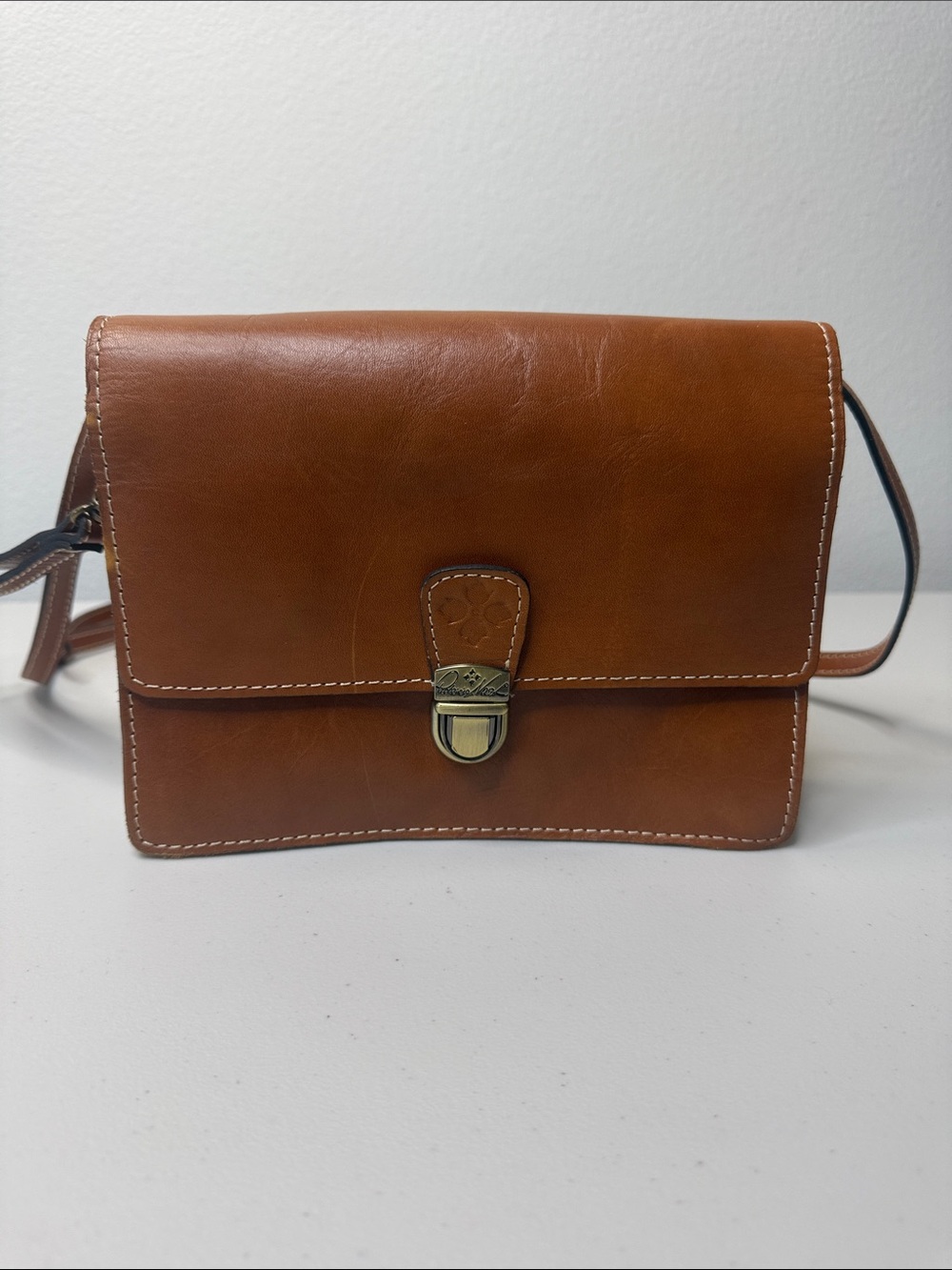 Patricia Nash Cognac Leather Crossbody Bag with Brass Lock